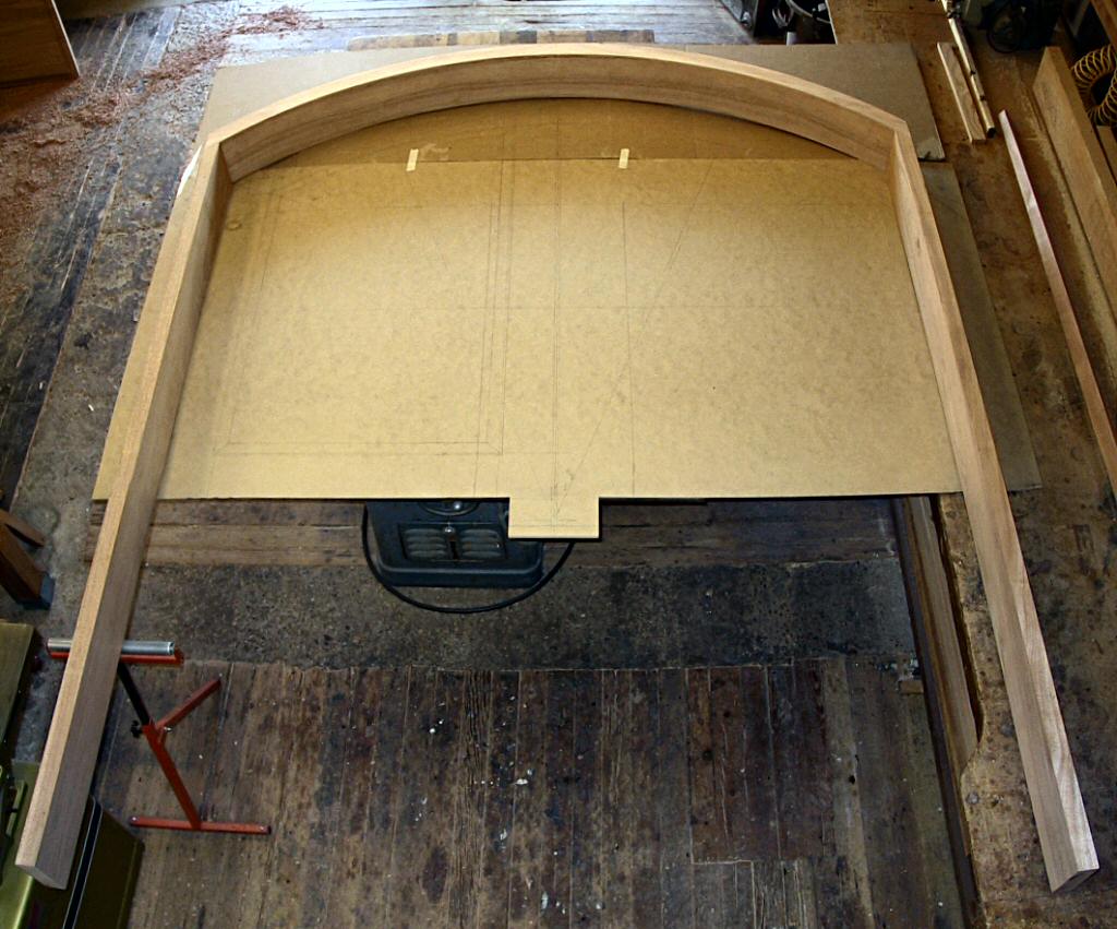 Arched mahogany door jamb