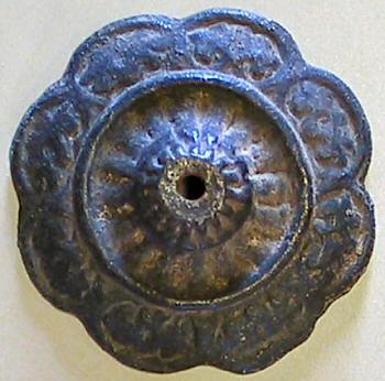 rosette with dark bronze patina