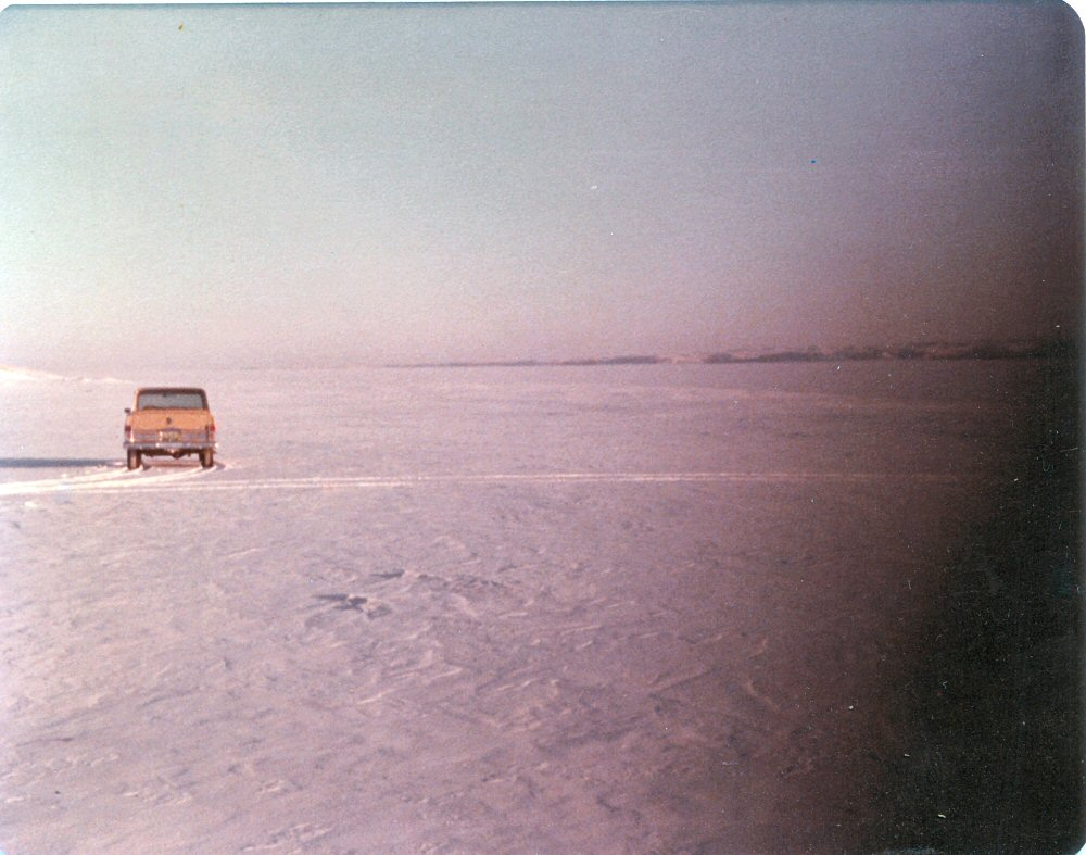 1977 Jeep Wagoneer  on a frozen lake