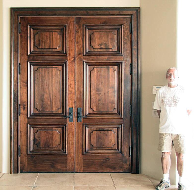 Aged 9' tall walnut double doors
