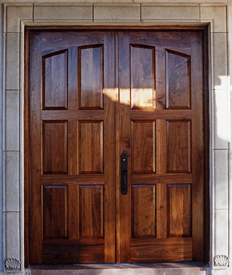 Arched walnut double doors