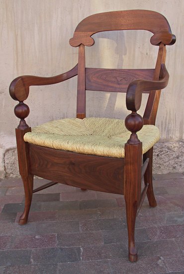 Walnut chair with a woven rush seat