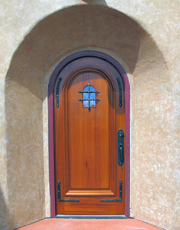 mahogany entry with wrought iron