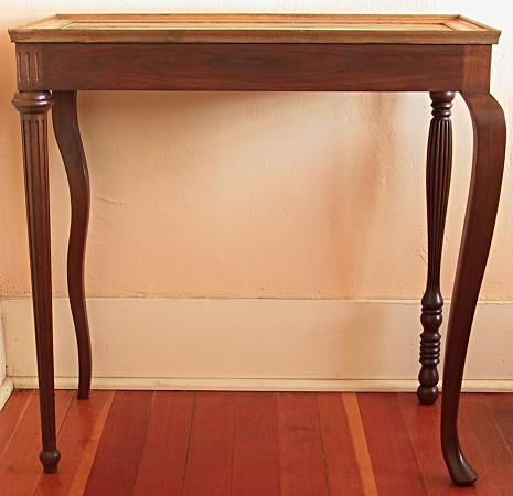 Eclectic table with four different legs